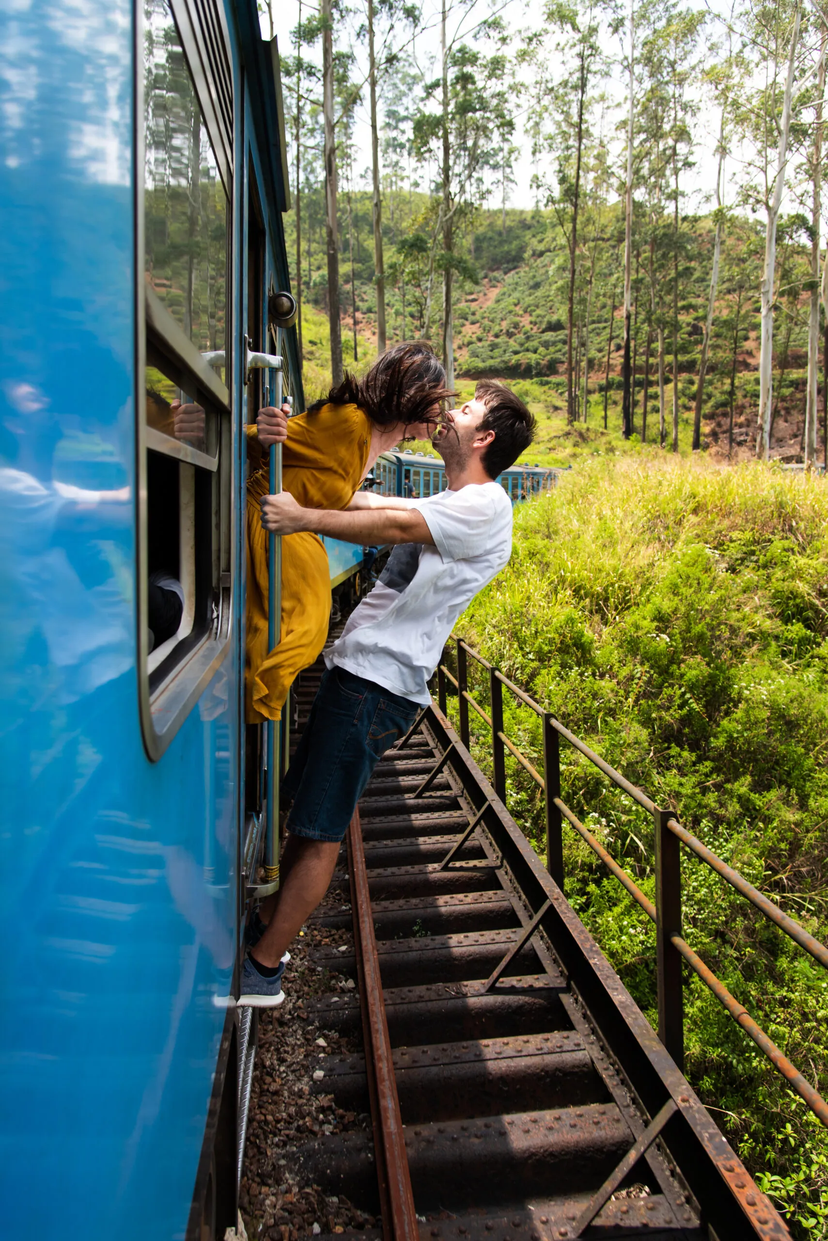 Couple,Kissing,On,A,Blue,Train,Ride,In,Sri,Lanka